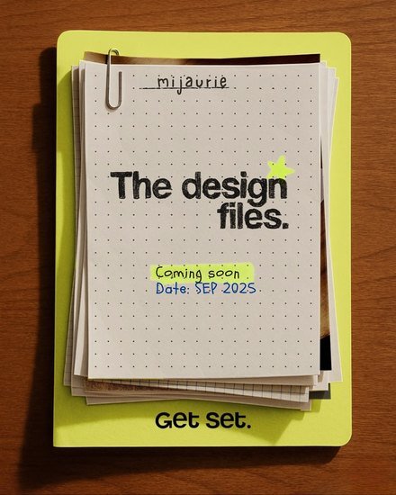 Notebook and design files on a desk